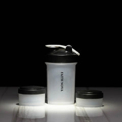 SHAKER BOTTLE WITH STORAGE COMPARTMENTS