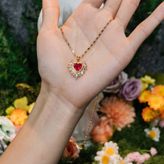 Sacred Heart Wing Necklace – Gold-Plated Red Gemstone Pendant