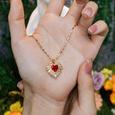Sacred Heart Wing Necklace – Gold-Plated Red Gemstone Pendant