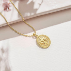 Madonna Lily Cross Medallion Necklace