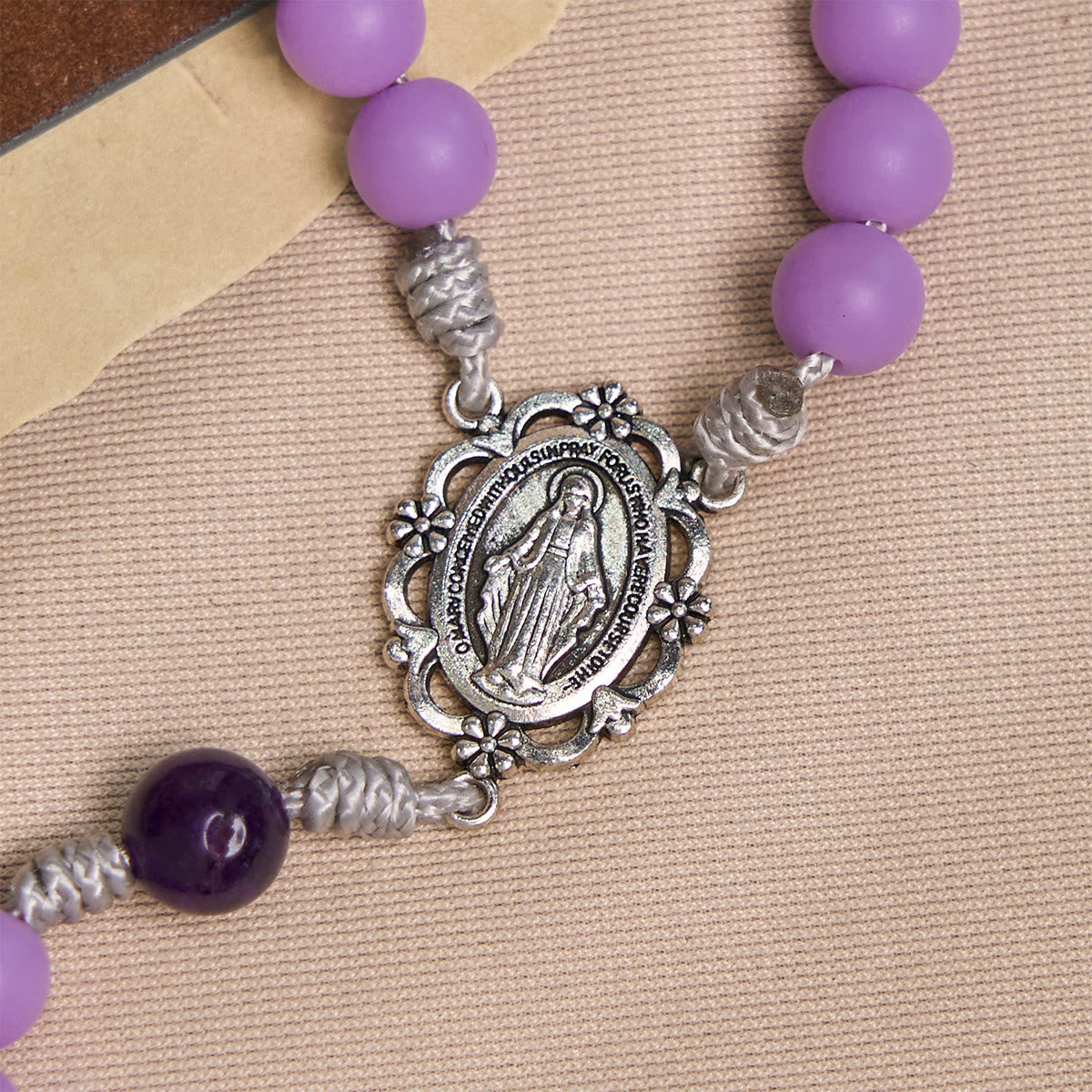 Mystic Purple Matte Rosary Adorned with Crucifix Scene and Miraculous Medal