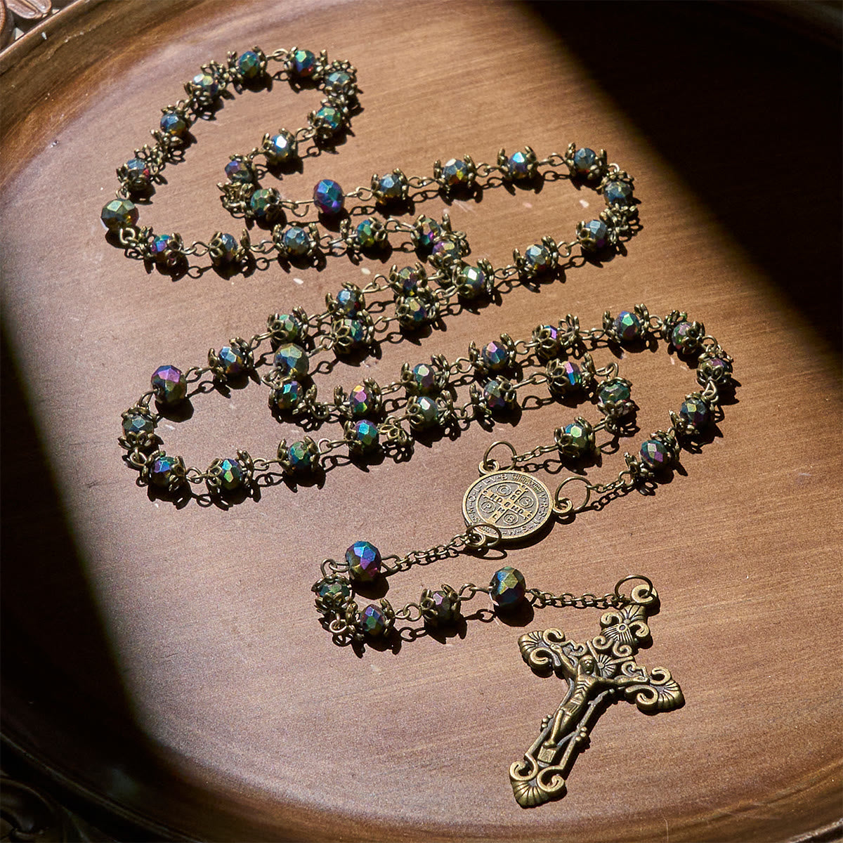 Faithful Hematite Rosary Featuring Bronze Crucifix and Saint Benedict Charm