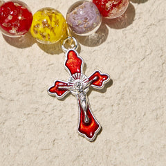 Colorful Glow-in-the-Dark Gold-Flecked Glass Bracelets with Crucifix