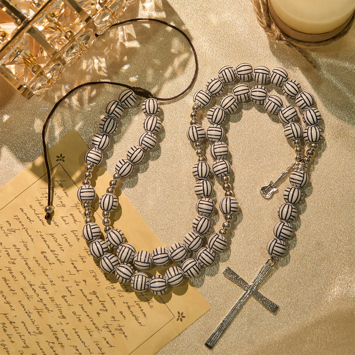 Victory in Christ Volleyball Prayer Rosary with Guitar Charm: A Melody of Prayer