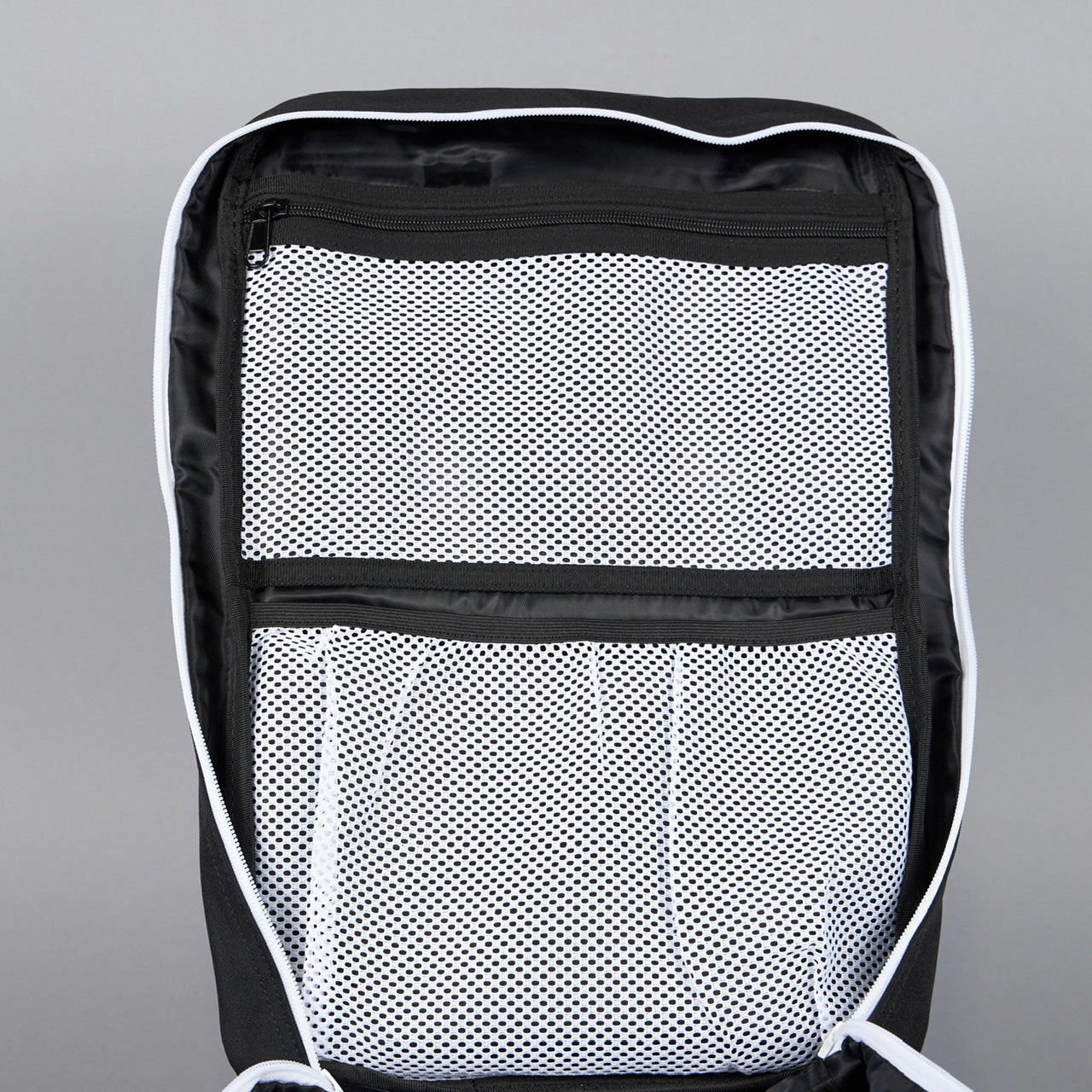 35L Alpha Black Backpack – White Accent