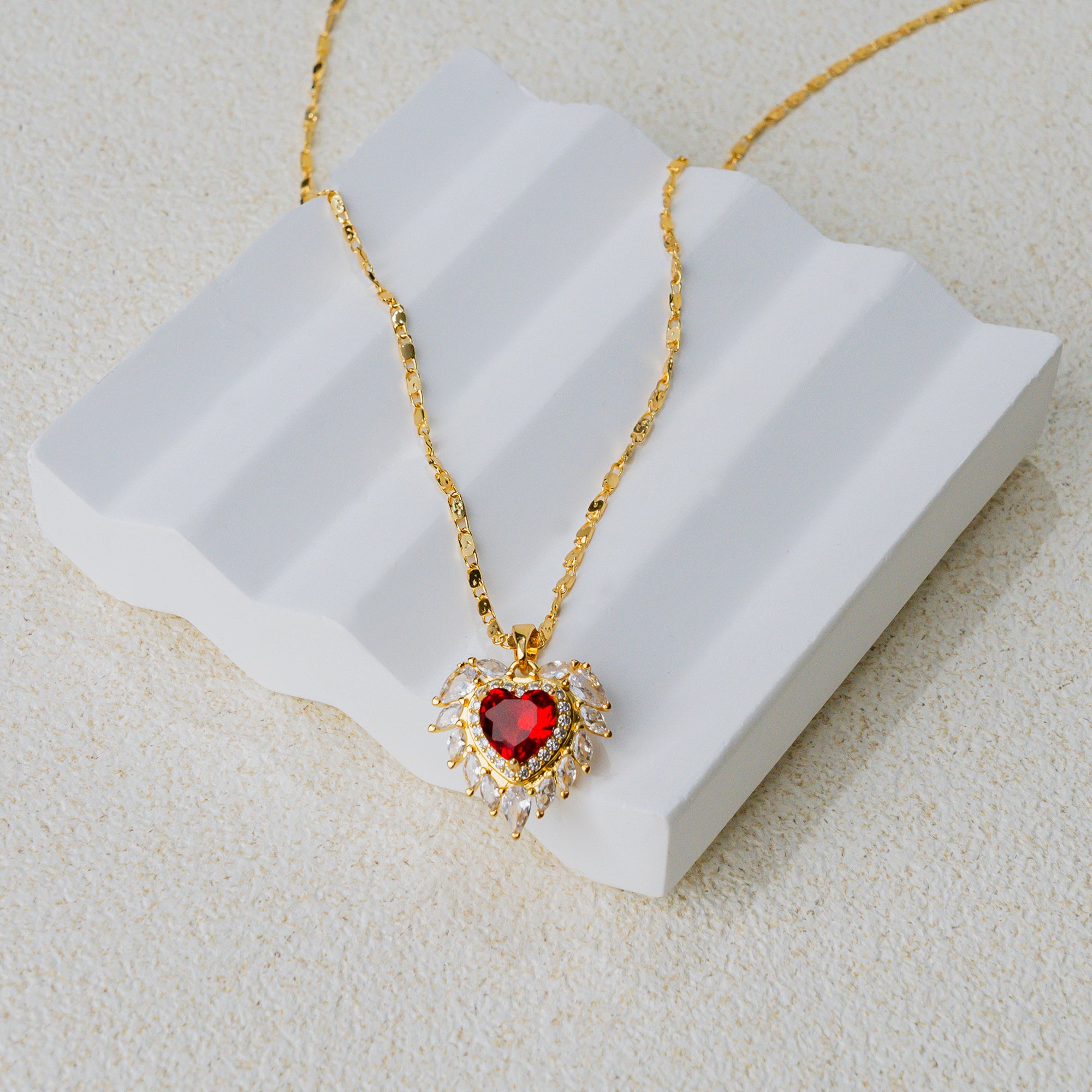 Sacred Heart Wing Necklace – Gold-Plated Red Gemstone Pendant