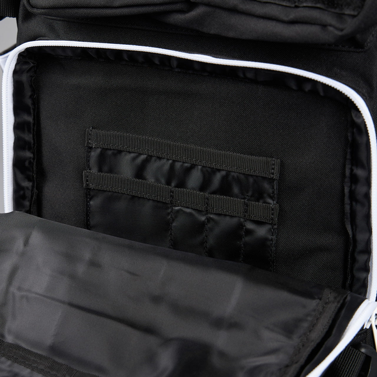 35L Alpha Black Backpack – White Accent