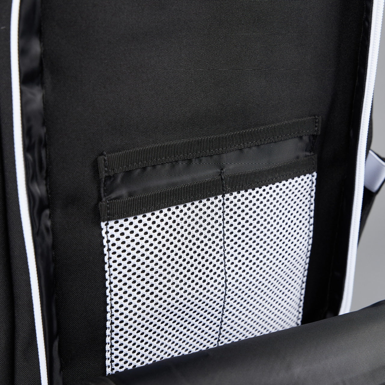 35L Alpha Black Backpack – White Accent