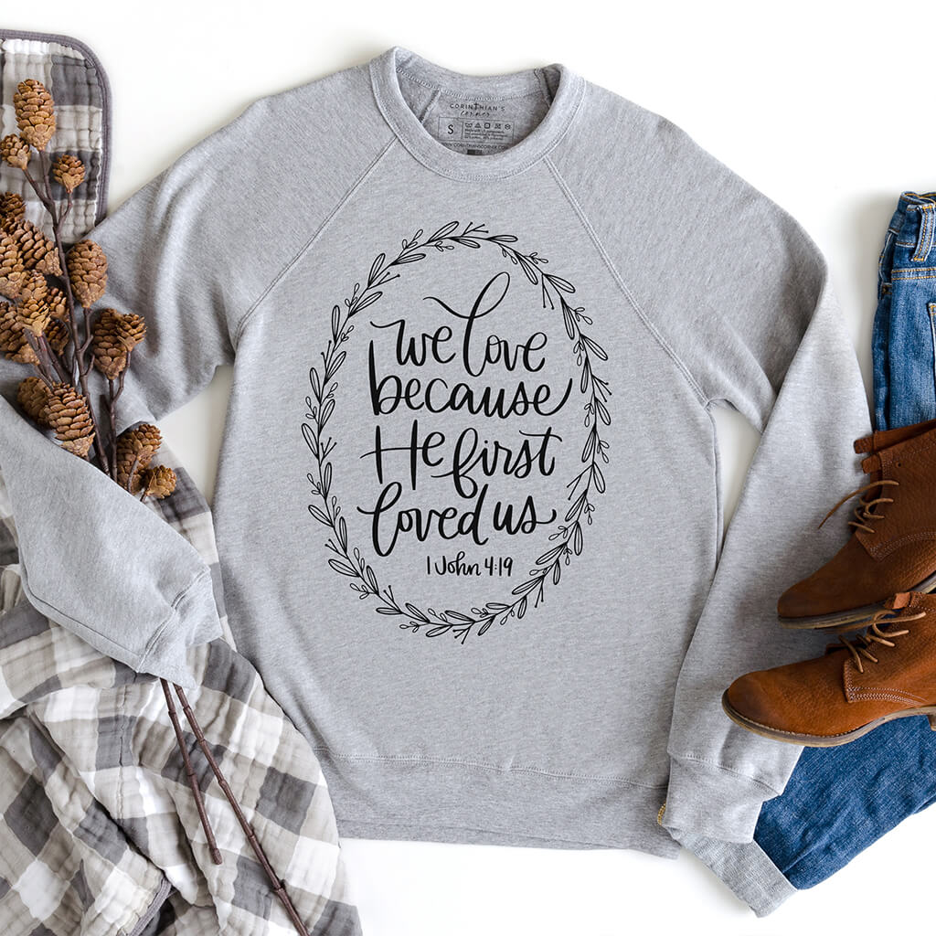 He First Loved Us Premium Fleece Sweatshirt